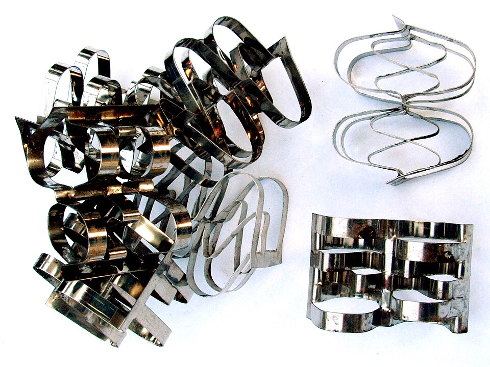 Raschig rings, a type of random packing used in absorption and distillation columns